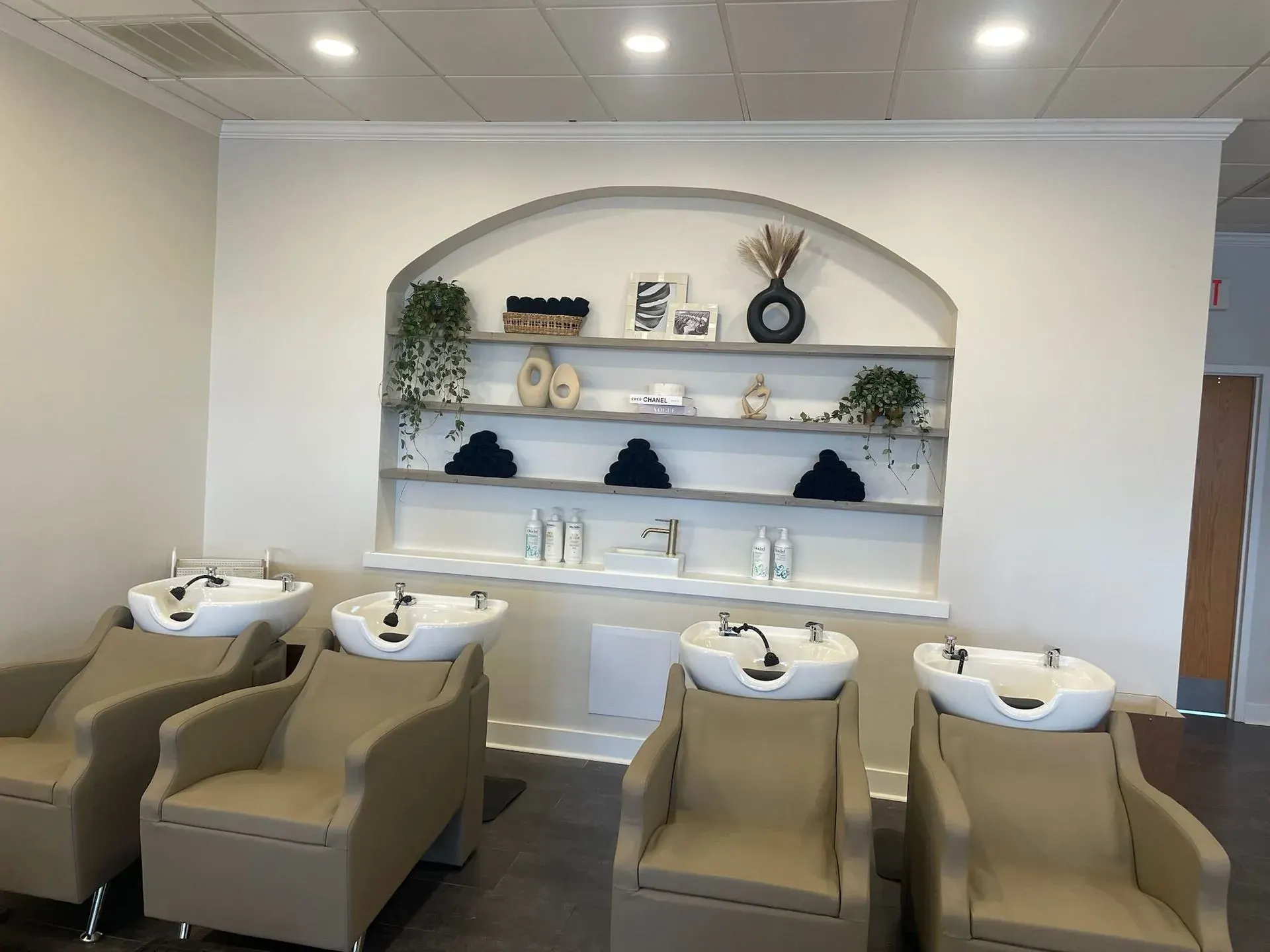 Salon wash stations under recessed ceiling lights