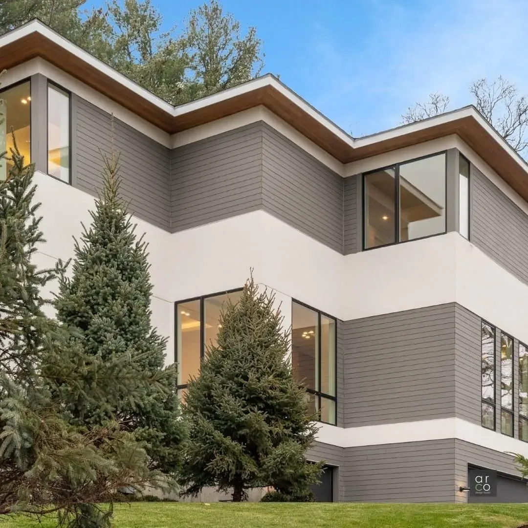 Contemporary home exterior with large windows