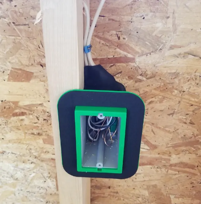 Old-work electrical box with cable pulled in during a rough-in
